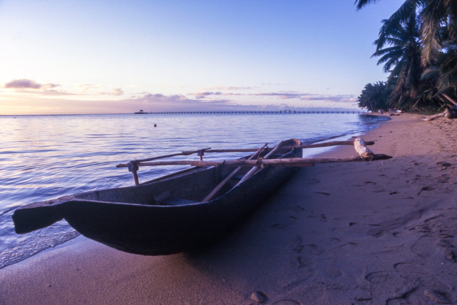 Pirogue at the sunset