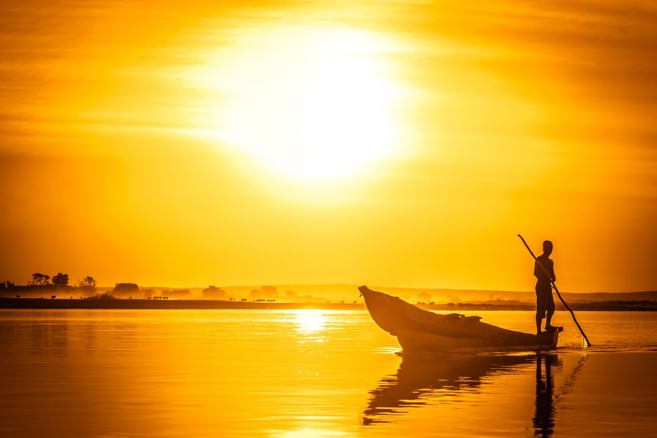 Pirogue at sunset